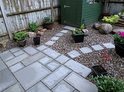 garden refurb, grey indian flag, low maintenance pebbles, curved steps