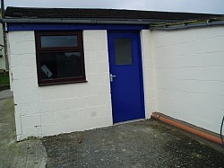 Rspca garage bricked up, made into grooming, shower room for dogs watertanks, window, door all reclaimed