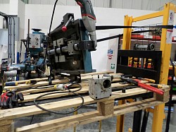 Machine undergoing repair, changing soft iron shearpins