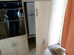 Secret door modifications for hidden fridge freezer in static caravan