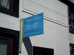 Hanging letting agency signs