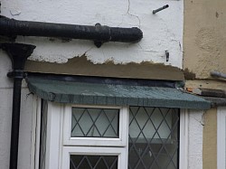 Landlord property, stolen lead flashing. Repaired with new felt , felt flashing and bellcast bead,to be painted later