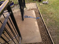 2 extra flags laid small patio