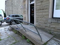 Handrail been hit by car billington post office will remove and repair