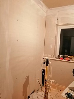 Kitchen converted to snug/office, plastering