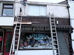 untidy shop front before freshen up 