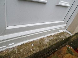 Rain deflector strip installed just above threshold to stop water ingress problem