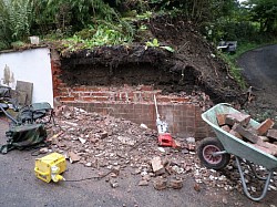 End of wall being demolished to build curved wall, its constructed with 3 thick of accrington brick , header bonds every 6 courses