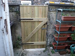 New tanelised yard gate made and  installed 