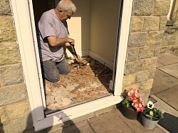 Remove vestibule floor and skirting, ply has delaminated going to concrete instead