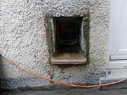 Stone sided and stone base catflap tunnel made rather than using cheap plastic tunnel