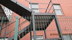 Fire escape repainting following sandblasting